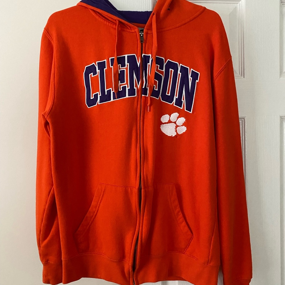 Clemson zip up hoodie and Tervis tumbler.